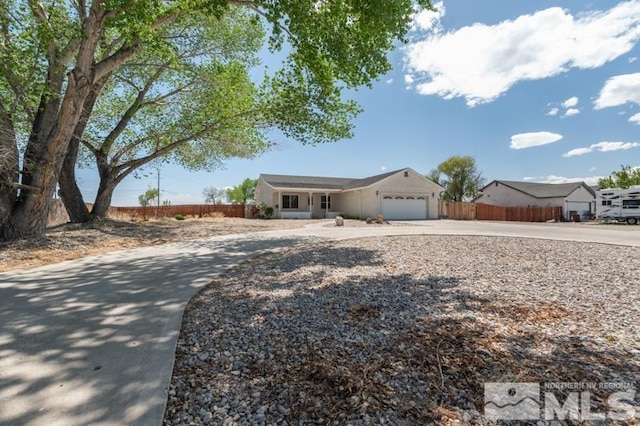 95 Hunter Park Way, Fallon, NV 89406 - single story home with driveway, a garage, and fence