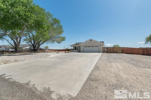 95 Hunter Park Way, Fallon, NV 89406 - view of front of property featuring driveway, an attached garage, and fence