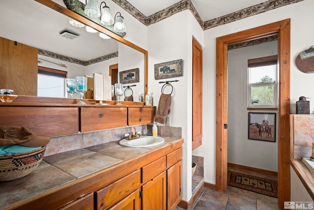 6811 Reno Hwy, Fallon, NV 89406 - bathroom with vanity and baseboards