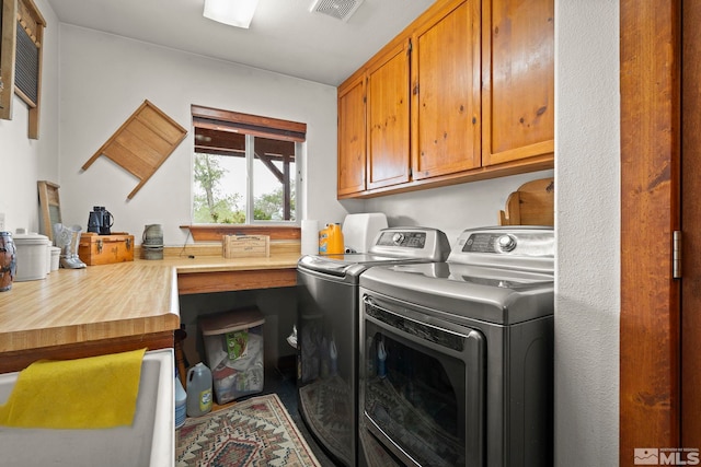 6811 Reno Hwy, Fallon, NV 89406 - washroom featuring independent washer and dryer and cabinet space