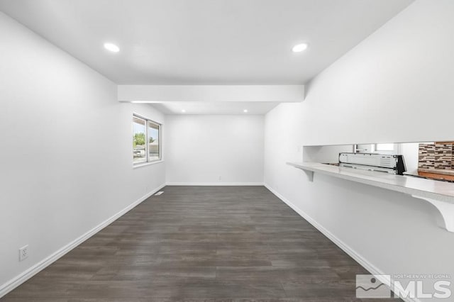 2441 Baxter, Sparks, NV 89431 - below grade area featuring dark wood-style floors, baseboards, and recessed lighting