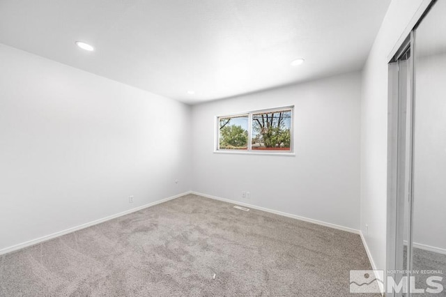 2441 Baxter, Sparks, NV 89431 - spare room with carpet, baseboards, and recessed lighting