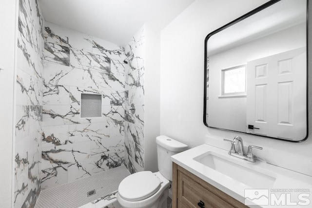 2441 Baxter, Sparks, NV 89431 - bathroom with toilet, a marble finish shower, and vanity