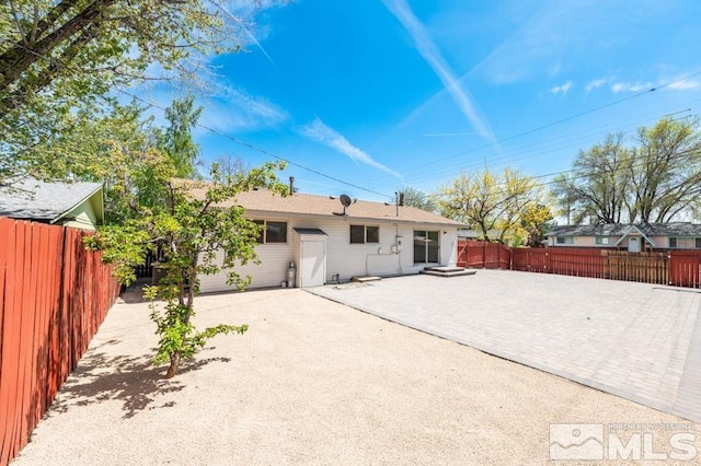 2441 Baxter, Sparks, NV 89431 - rear view of house with a patio and a fenced backyard