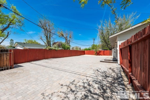 2441 Baxter, Sparks, NV 89431 - fenced backyard with a patio