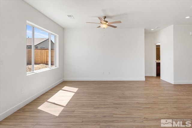 887 Agate, Fernley, NV 89408 - spare room with ceiling fan, baseboards, light wood-style floors, and recessed lighting