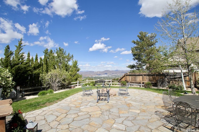 3463 White Mountain Ct, Reno, NV 89511 - view of patio featuring a mountain view and outdoor dining space