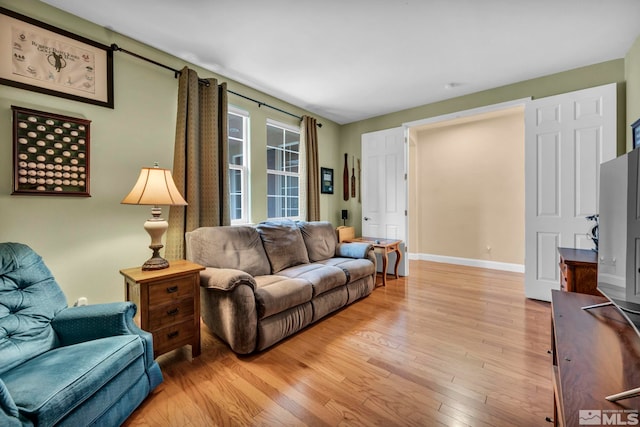 3463 White Mountain Ct, Reno, NV 89511 - living room featuring light wood-style flooring and baseboards