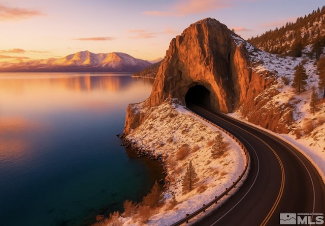 1308 Cave Rock Dr Unit C, Glenbrook, NV 89413 - water view featuring a mountainous background