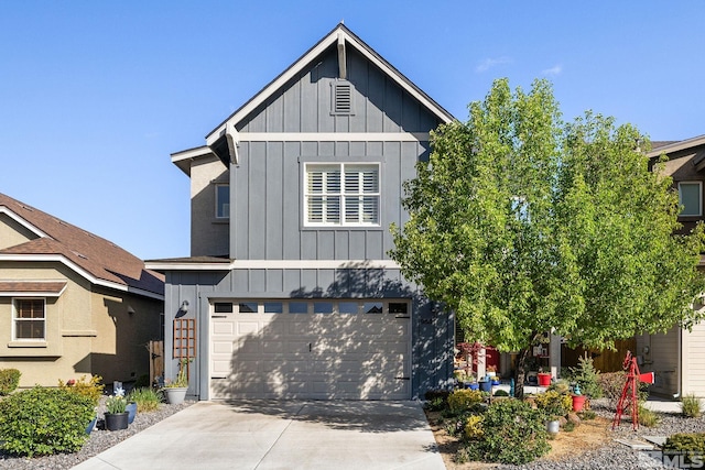 958 Marble Hills Cir, Sparks, NV 89436 - view of front facade with board and batten siding, a garage, and driveway