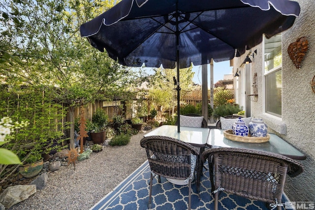 958 Marble Hills Cir, Sparks, NV 89436 - view of patio featuring a fenced backyard and outdoor dining area