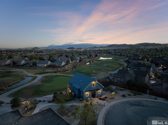 958 Marble Hills Cir, Sparks, NV 89436 - aerial view at dusk of a residential view, a mountain view, and view of golf course