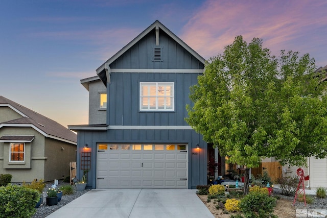 958 Marble Hills Cir, Sparks, NV 89436 - view of front of home with board and batten siding, driveway, and a garage
