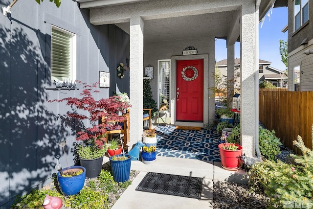 958 Marble Hills Cir, Sparks, NV 89436 - property entrance with fence, stucco siding, and a porch