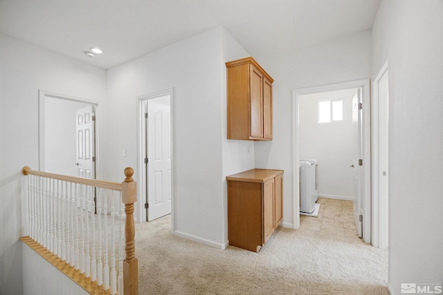 7150 Provence Cir, Reno, NV 89523 - hallway featuring an upstairs landing, light carpet, washer / clothes dryer, baseboards, and recessed lighting