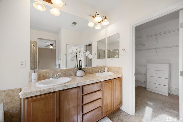 7150 Provence Cir, Reno, NV 89523 - bathroom with a spacious closet, double vanity, and ceiling fan