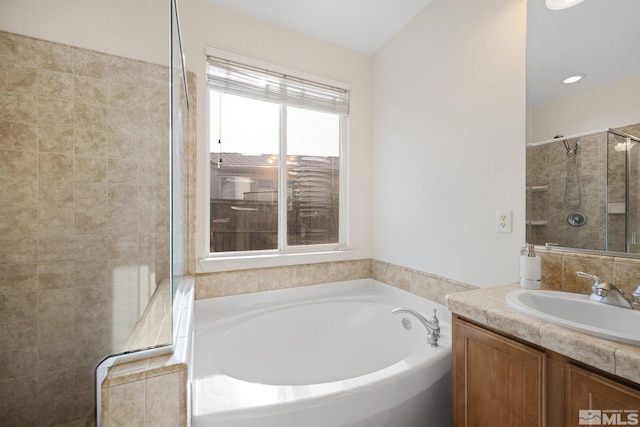 7150 Provence Cir, Reno, NV 89523 - bathroom featuring a garden tub, vanity, and a tile shower