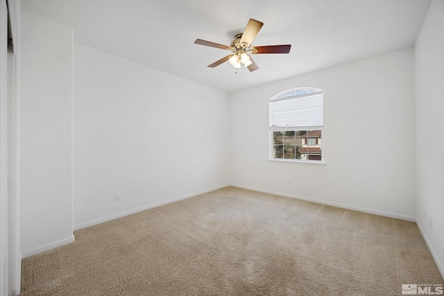 7150 Provence Cir, Reno, NV 89523 - spare room with carpet floors, a ceiling fan, and baseboards