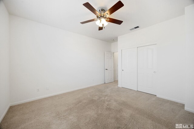 7150 Provence Cir, Reno, NV 89523 - unfurnished bedroom featuring light carpet and baseboards
