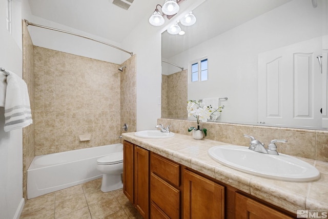7150 Provence Cir, Reno, NV 89523 - bathroom featuring  shower combination, toilet, double vanity, and tile patterned flooring