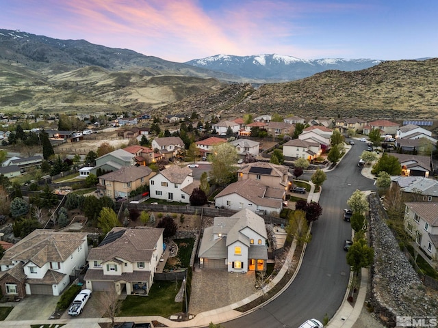 7150 Provence Cir, Reno, NV 89523 - aerial view at dusk of a residential view and a mountain view
