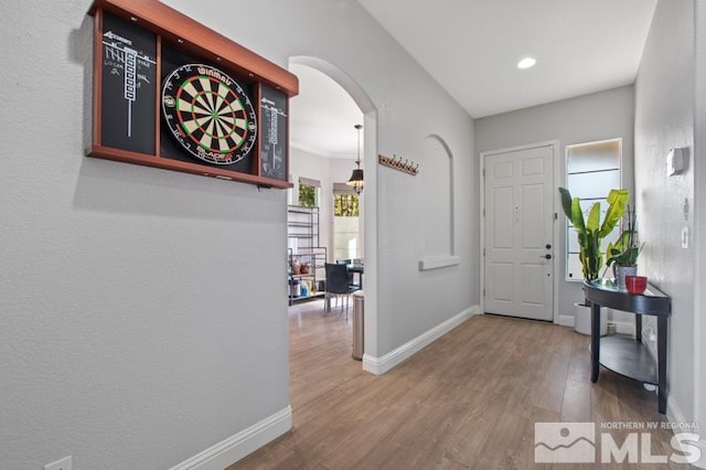 4531 Pyramid Peak Cir, Sparks, NV 89436 - entryway featuring arched walkways, wood finished floors, baseboards, and recessed lighting