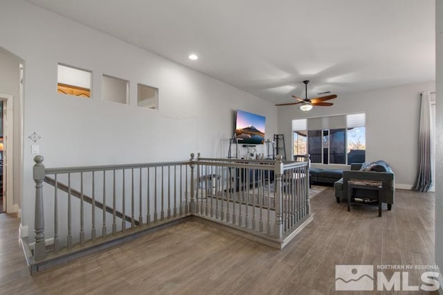 4531 Pyramid Peak Cir, Sparks, NV 89436 - living area with wood finished floors, a ceiling fan, recessed lighting, and baseboards
