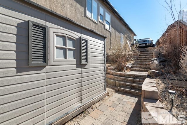 4531 Pyramid Peak Cir, Sparks, NV 89436 - view of side of home with stairway