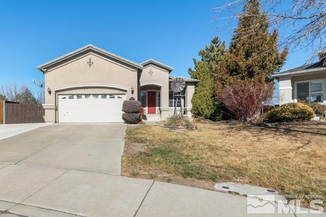 4531 Pyramid Peak Cir, Sparks, NV 89436 - view of front of property featuring concrete driveway, stucco siding, and an attached garage