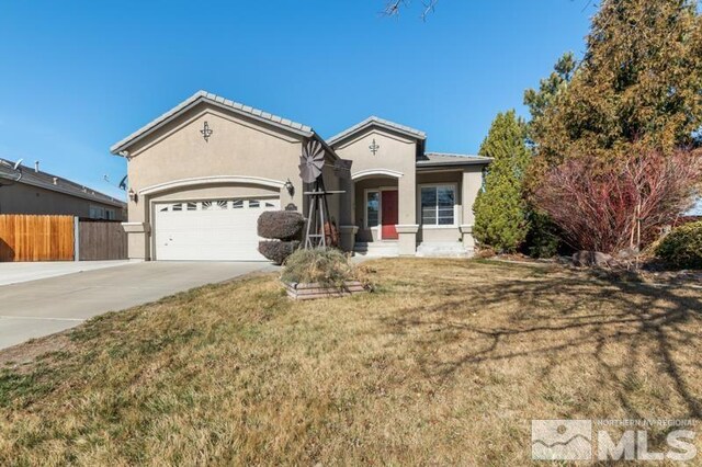4531 Pyramid Peak Cir, Sparks, NV 89436 - view of front of house featuring concrete driveway, stucco siding, and a garage