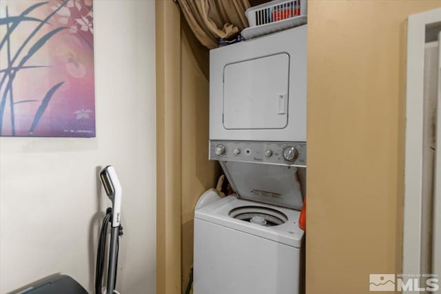 50 N Sierra St Unit 1109, Reno, NV 89501 - clothes washing area with stacked washer / dryer