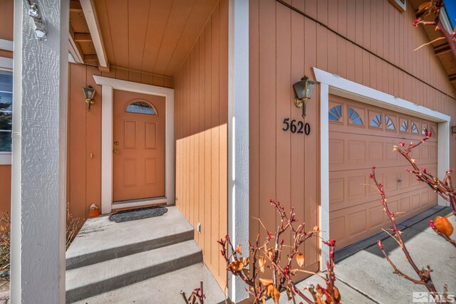 5620 Tassel Dr, Sun Valley, NV 89433 - entrance to property with a garage