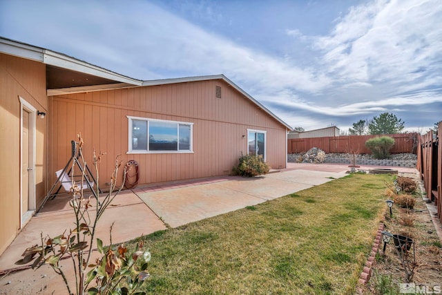 5620 Tassel Dr, Sun Valley, NV 89433 - back of house featuring a patio