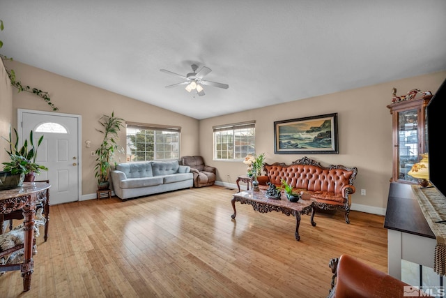 5620 Tassel Dr, Sun Valley, NV 89433 - living room with a ceiling fan, lofted ceiling, wood finished floors, and baseboards