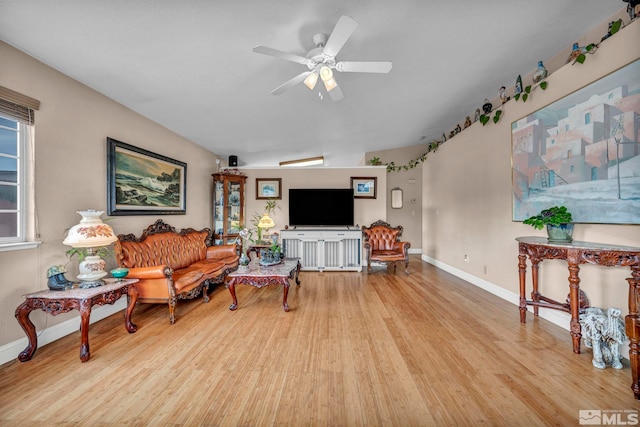 5620 Tassel Dr, Sun Valley, NV 89433 - living area featuring wood finished floors, baseboards, and ceiling fan