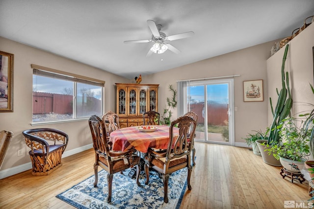 5620 Tassel Dr, Sun Valley, NV 89433 - dining space featuring lofted ceiling, hardwood / wood-style floors, baseboards, and ceiling fan
