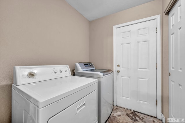 5620 Tassel Dr, Sun Valley, NV 89433 - clothes washing area featuring washer and clothes dryer