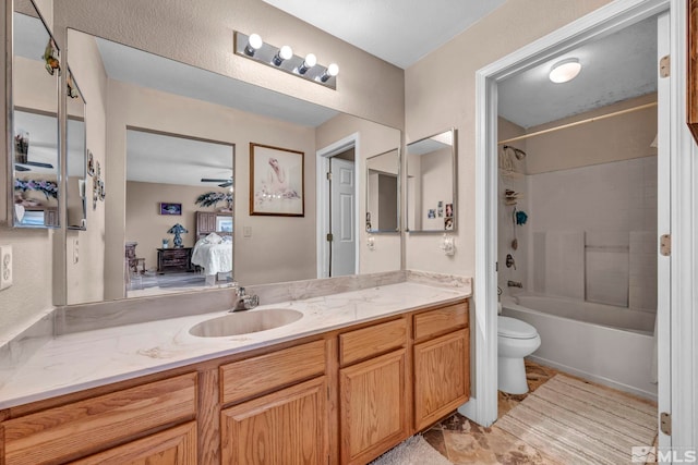 5620 Tassel Dr, Sun Valley, NV 89433 - bathroom with ensuite bathroom, vanity, toilet, ceiling fan, and washtub / shower combination