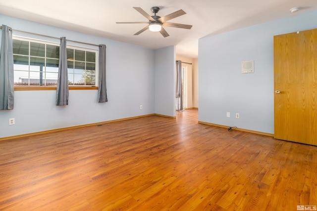 5925 Arvilla Ln, Fallon, NV 89406 - empty room featuring wood finished floors, ceiling fan, a smoke detector, and baseboards