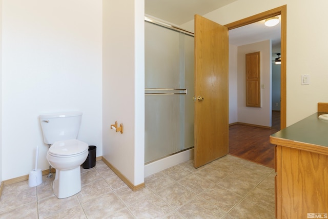 5925 Arvilla Ln, Fallon, NV 89406 - bathroom with a stall shower, toilet, and baseboards
