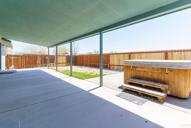 5925 Arvilla Ln, Fallon, NV 89406 - view of patio featuring a hot tub and a fenced backyard
