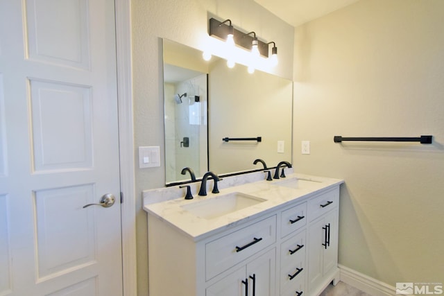 916 Tillman Ln, Gardnerville, NV 89460 - bathroom with a tile shower and double vanity