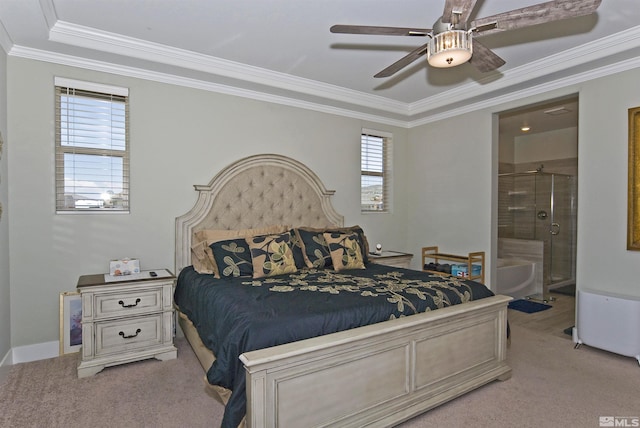bedroom with light colored carpet, ornamental molding, connected bathroom, and a ceiling fan
