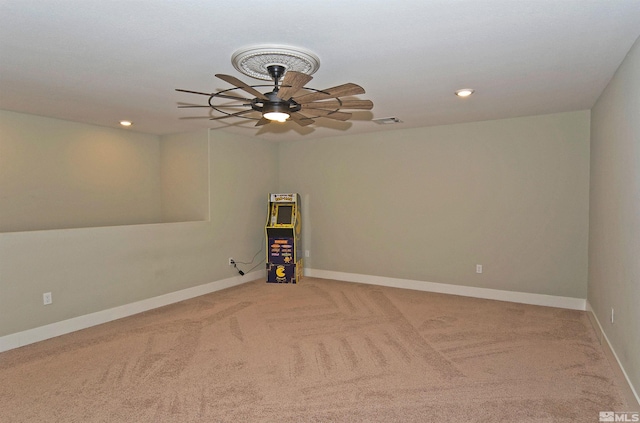 empty room with carpet, ceiling fan, recessed lighting, and baseboards
