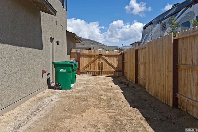 view of yard featuring a gate and fence