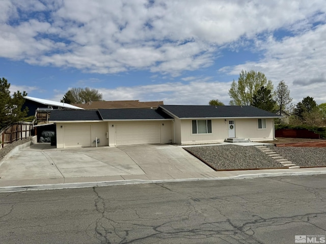 574 W National Ave, Winnemucca, NV 89445 - ranch-style house with an attached garage and driveway