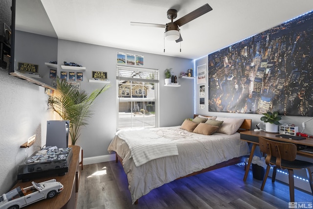 2445 Libero, Sparks, NV 89436 - bedroom featuring wood finished floors, ceiling fan, and baseboards