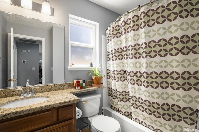 2445 Libero, Sparks, NV 89436 - full bath with toilet, vanity, shower / bath combo with shower curtain, and a textured wall