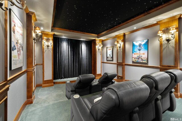 12360 High Vista Dr, Reno, NV 89511 - carpeted home theater featuring ornamental molding, a raised ceiling, and baseboards