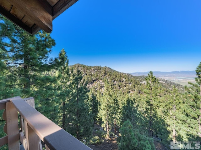 261 Quaking Aspen Ln Unit 8, Stateline, NV 89449 - view of mountain background featuring a heavily wooded area